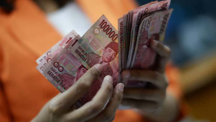 Count Your Rupiah After Exchanging Money - Source: Bloomberg